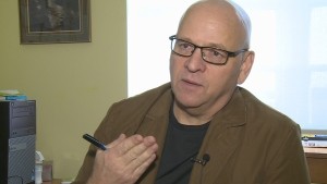 Michael Camp, a journalism professor at St. Thomas University in Fredericton, is seen here in a recent interview with CBC News. Photo: CBC News